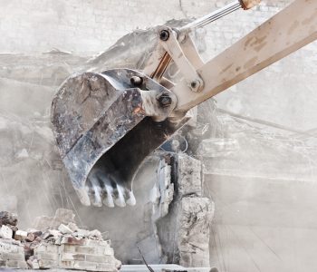 excavator-demolishing-old-building_173948-5306