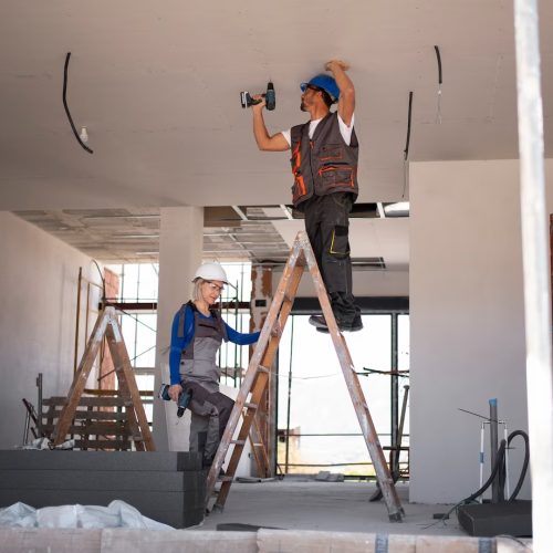 full-shot-man-woman-standing-ladder_23-2149366705