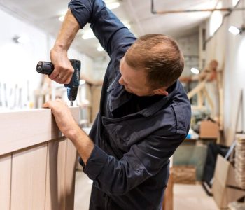hardworking-man-doing-his-job-woodshop_23-2148970813