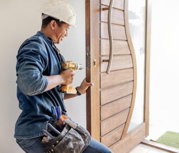 locksmith-man-maintenance-handyman-with-home-renovation-fixing-change-door-locks-with-power-tools-construction-building-industry-trade-with-manual-labour-vocation-emplo